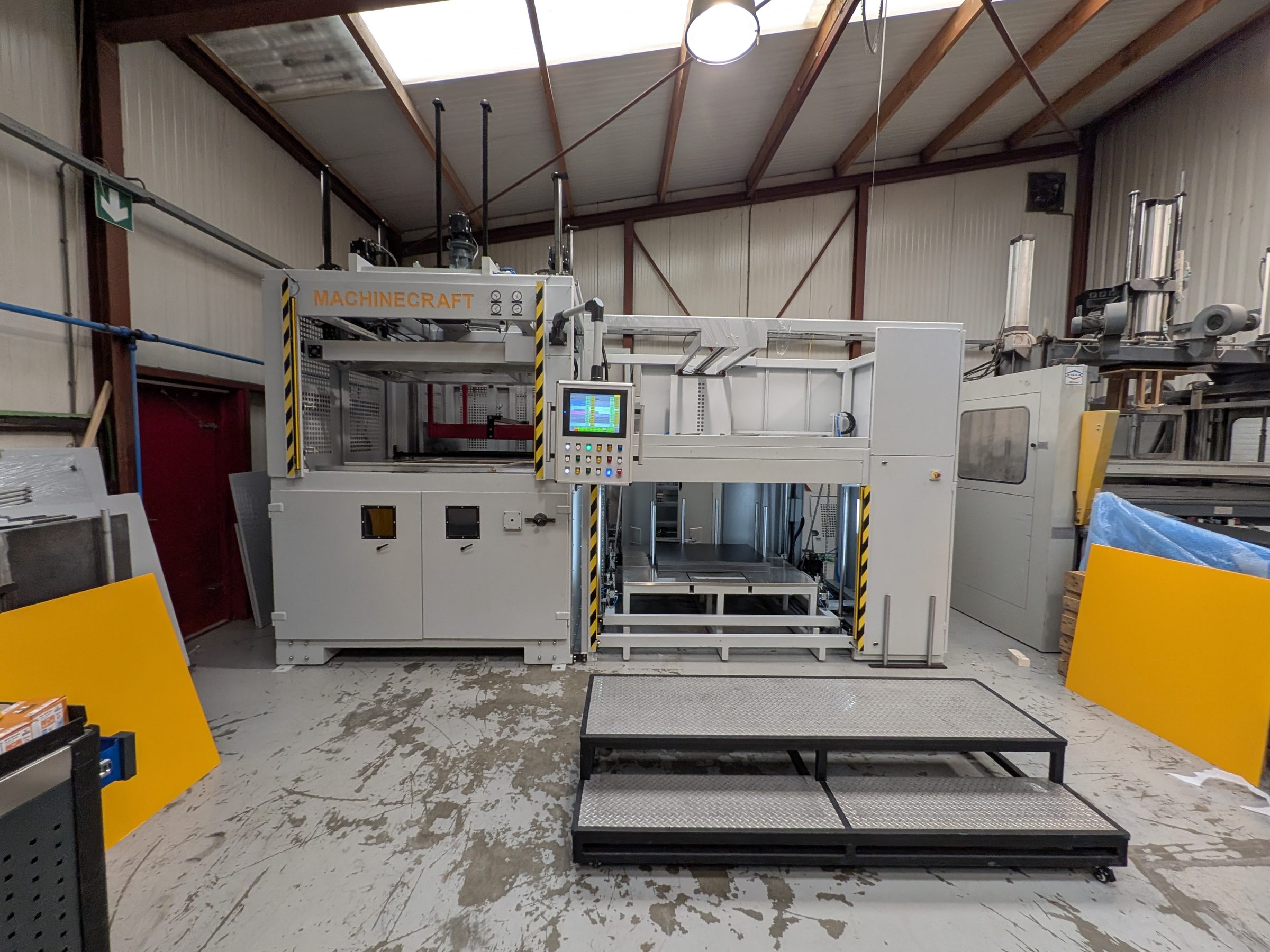 PF1 with sheet table in a yellow-column bay