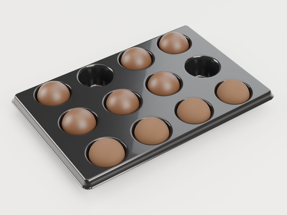 Black HIPS chocolate box insert with twelve pockets holding truffles